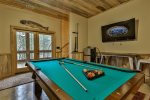 Terrace level game area with pool table 